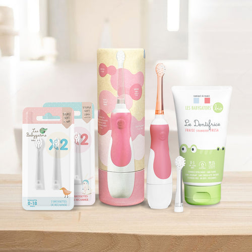 Pack Kdo Framboise Bébé : Brosse à dents sonique à pile pour Bébé avec Étui de voyage en Kraft + 2 Pack de brossettes + Dentifrice bébé 0-5 ans sans nanoparticule